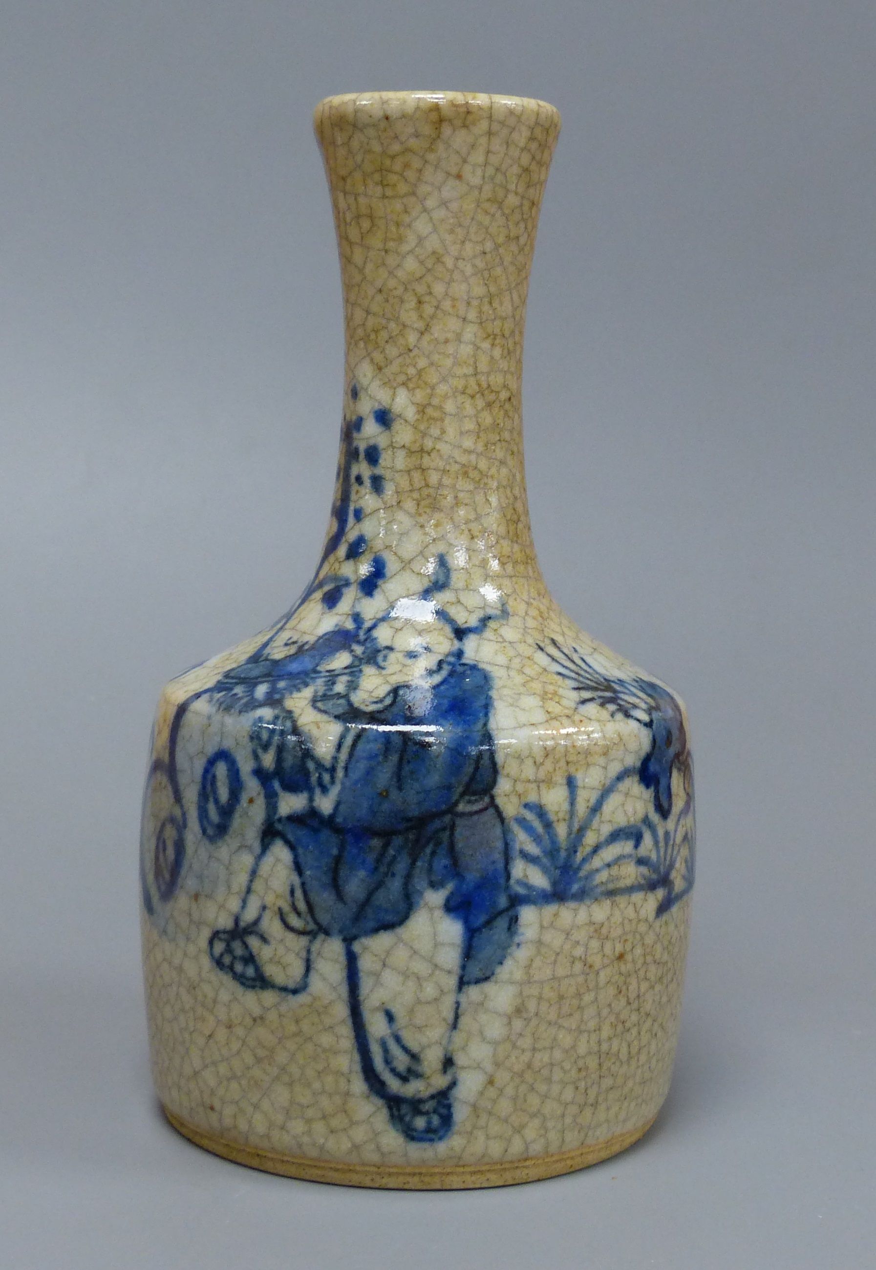A Chinese blue and white crackle glaze bottle vase, height 15cm